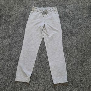 Lululemon On the Fly 7/8 Pants, size 2, gray and white stripe.